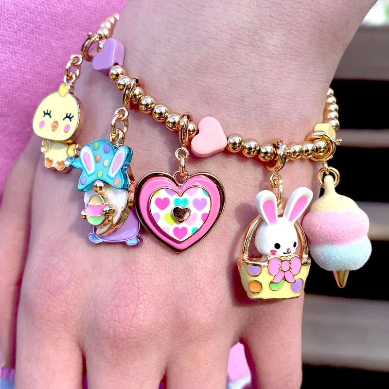 Gold Multi Heart Stretch Charm Bracelet with Enamel Bead Detail