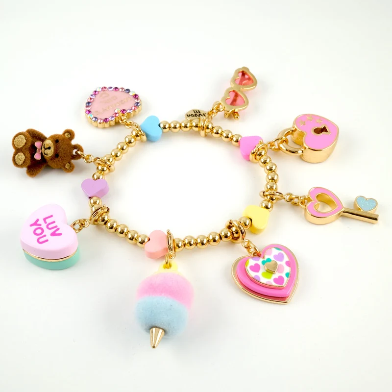 Gold Multi Heart Stretch Charm Bracelet with Enamel Bead Detail
