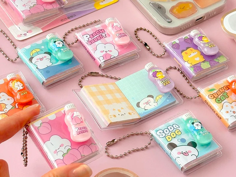 Lot de 2 Porte-clés mini carnets - Miniz Buddy (couleurs aléatoires)
