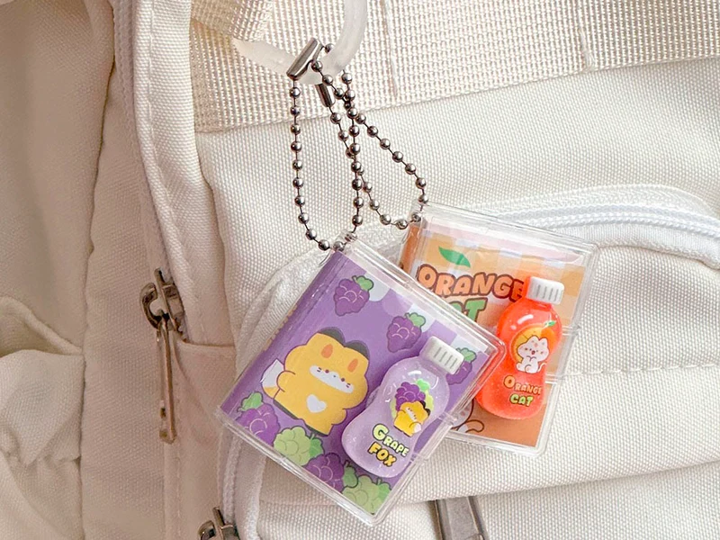 Lot de 2 Porte-clés mini carnets - Miniz Buddy (couleurs aléatoires)
