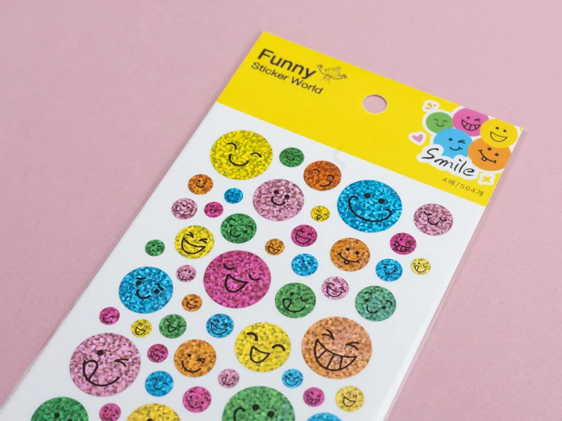 4 planches de stickers sourire holographiques