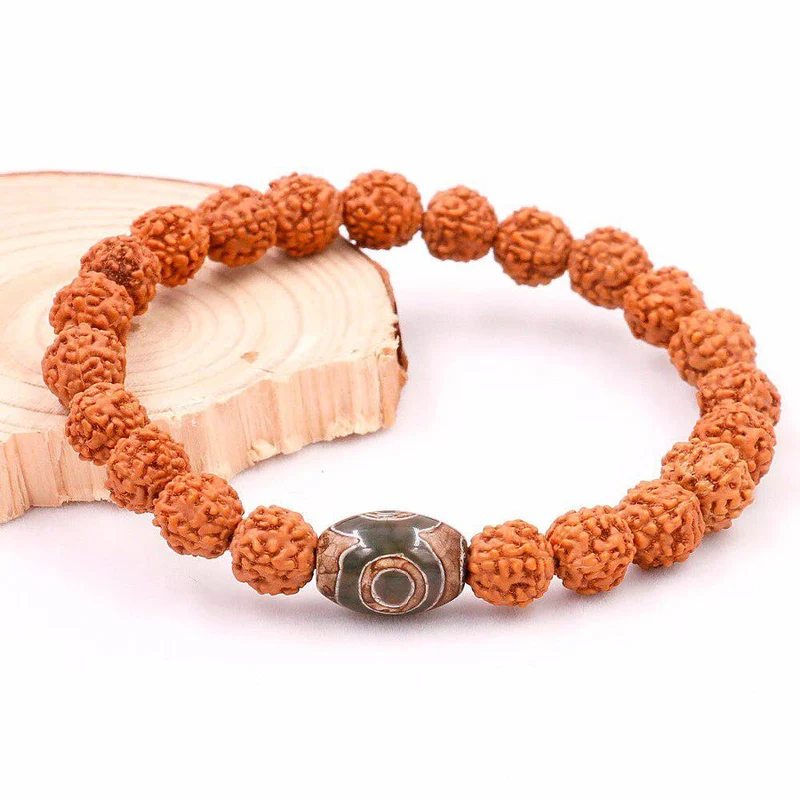 Bracelet en graines de Rudraksha naturelles et œil de Dzi