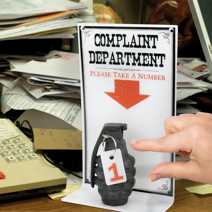 The Complaint Dept Sign