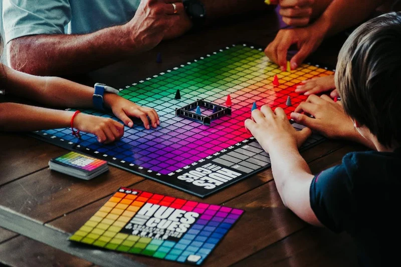 Hues & Cues Game: Strategy Board Game for 3-10 Players by The Op Games