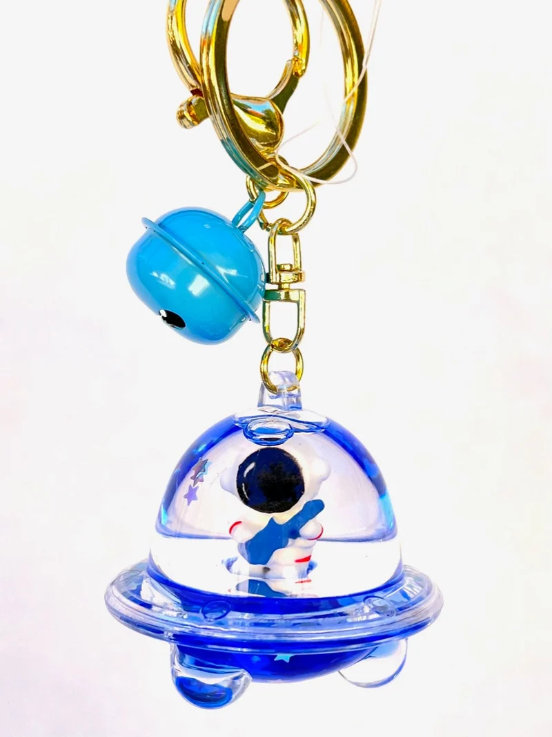 Astronaut UFO Keychain
